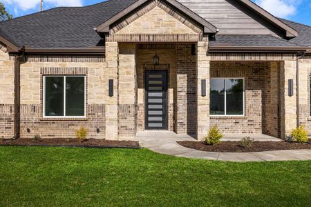 Entrance to property with a yard