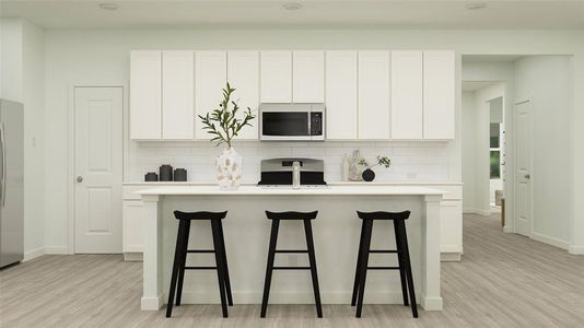 Kitchen featuring a center island with sink, backsplash, appliances with stainless steel finishes, light hardwood / wood-style floors, and white cabinets