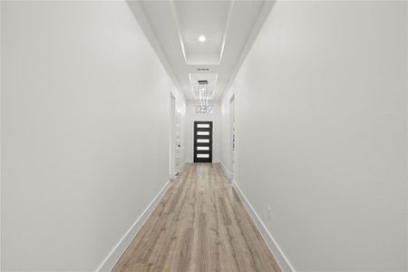 Hall with light wood-type flooring