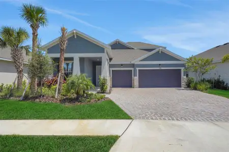 New construction Single-Family house 7470 Sea Manatee St, Parrish, FL 34221 plan Arlington w/Bonus - Single Family Homes - image
