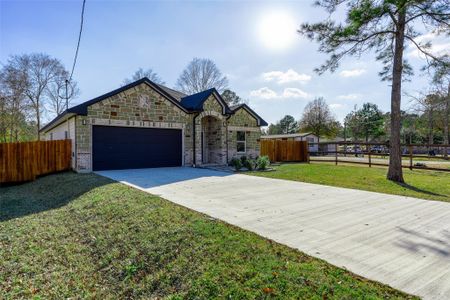 New construction Single-Family house 408 County Rd 3414, Cleveland, TX 77327 - image