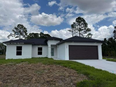 New construction Single-Family house 765 Puccini Ave S, Lehigh Acres, FL 33974 - image