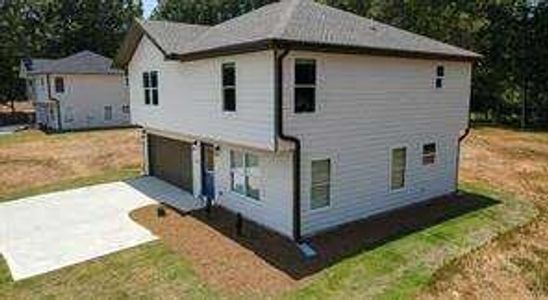 New construction Single-Family house 1341 E Atlanta Rd E, Stockbridge, GA 30281 - photo 0