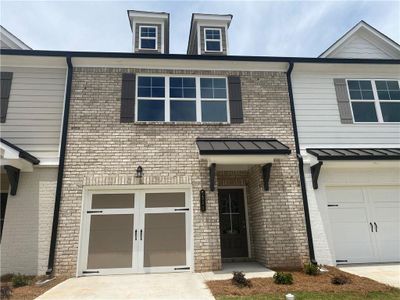 New construction Townhouse house 5350 Fox Den Road, Oakwood, GA 30566 - photo 0