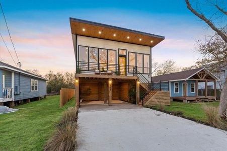 This stunning 4-bedroom, 2-bath home offers modern coastal living at its finest.