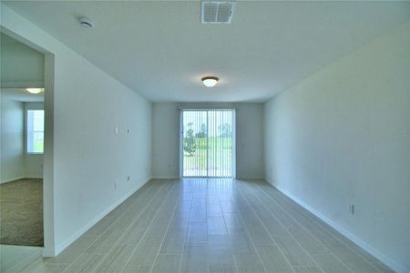 coming in from the front entrance, through foyer