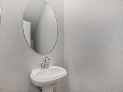 The powder bathroom on the first floor is convenient when hosting guests.