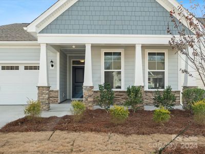 Beautiful exterior with stone accepts and front porch