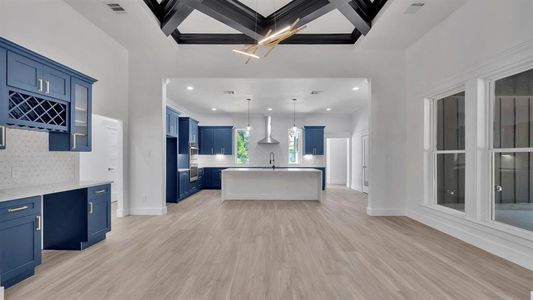 View of the kitchen and formal dining room.  Dining area has a view of the back yard. all the cabinets and drawers are soft close.