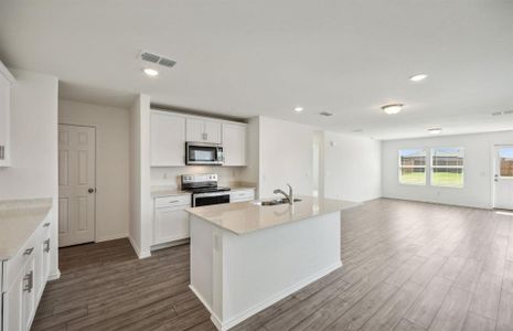 Airy kitchen with large windows *real home pictured