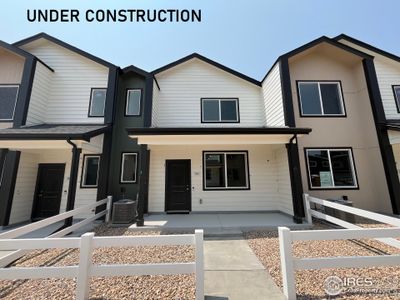 New construction Townhouse house 3744 Katina Way, Evans, CO 80620 - photo 0