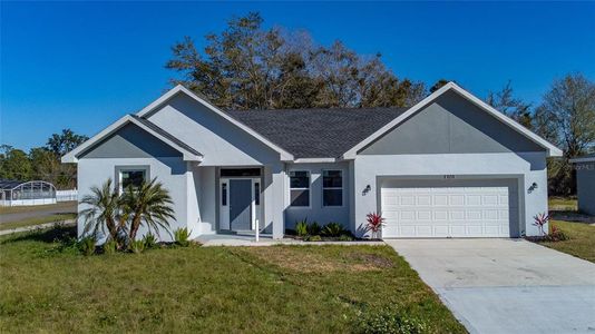 New construction Single-Family house 1701 Seabass Lane, Poinciana, FL 34759 - photo 0