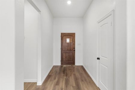 Corridor with wood-type flooring