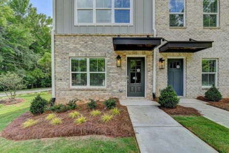 New construction Townhouse house 5497 Blossomwood Trail Sw, Mableton, GA 30126 - photo 1 1