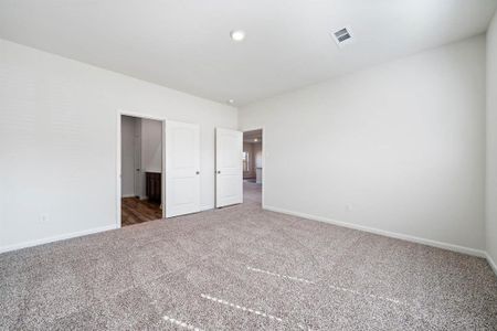 Unfurnished bedroom with carpet floors