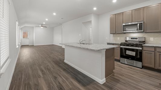 Kitchen to Dining Area and Family Room