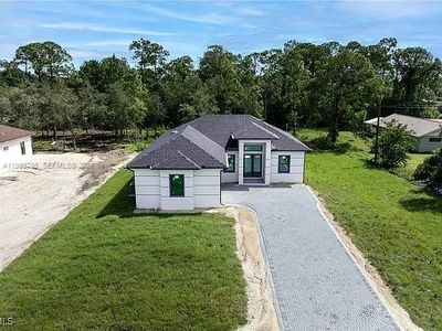New construction Single-Family house 702 Richmond Ave N, Lehigh Acres, FL 33972 - image