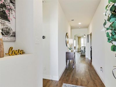 Hall featuring dark hardwood / wood-style floors