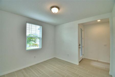 front entry and foyer from flex room