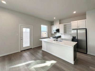 1st Floor - Kitchen open to Living Room.