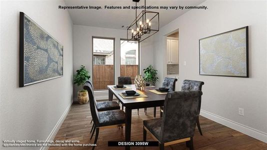 Dining room with a notable chandelier and dark hardwood / wood-style flooring