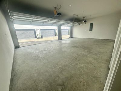 spacious and unique 3 car garage