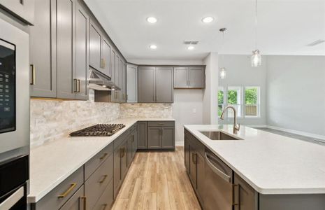 Bright kitchen with ample cabinet space *real home pictured