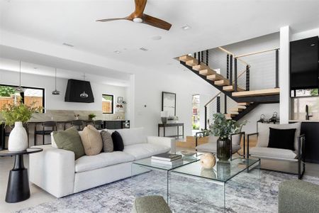 Living room featuring ceiling fan