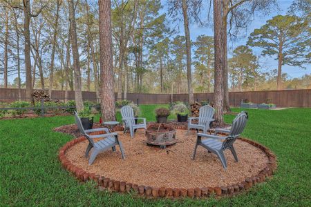 Prefer a wood fire out back? Come on out past the patio - you will enjoy the stars in the peaceful evenings. This property is 3/4 of an acre and it is beautifully landscaped!