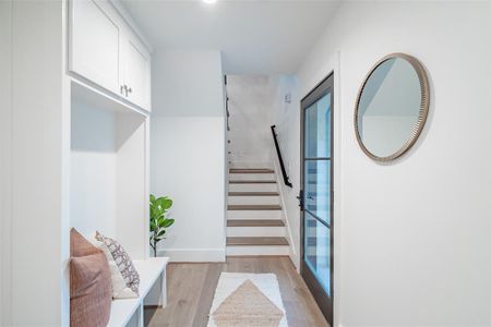 Mudroom featuring light wood-type flooring