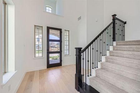 Foyer featuring light wood-type flooring