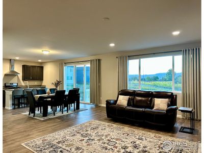 Plenty of space for entertaining with an open floorplan, oversized living room and unparalleled mountain views from the large windows and oversized sliding glass door.