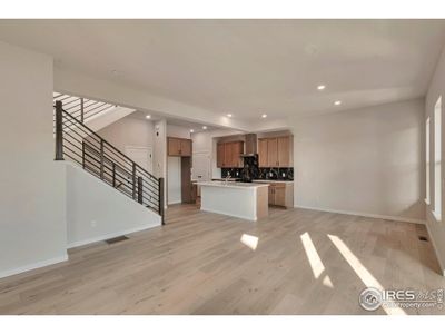 Large Family Room w/ Extended Laminate Hardwood