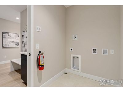 Dedicated, spacious laundry room.