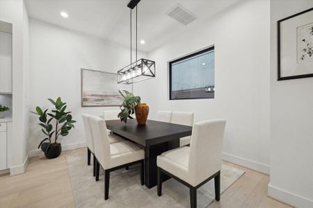 The dining space right off of the kitchen can easily fit 6-8 guests - Perfect for the holidays, birthdays, and dinner parties!