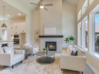 Anchored by a contemporary, floor-to-ceiling tiled fireplace, you will love the natural light and warm, sophisticated ambiance.