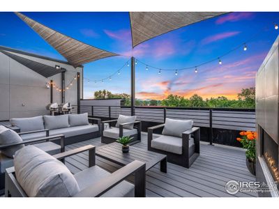 Mingle with neighbors and enjoy the beauty of downtown Loveland with this remarkable outdoor common deck which includes outdoor fireplace and bbq grills