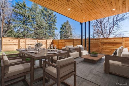 Expanded outdoor living space - covered patio with gas hook-up and fenced yard.Virtually staged.