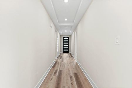 Hallway featuring light hardwood / wood-style floors