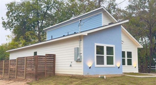 View of home's exterior featuring a lawn