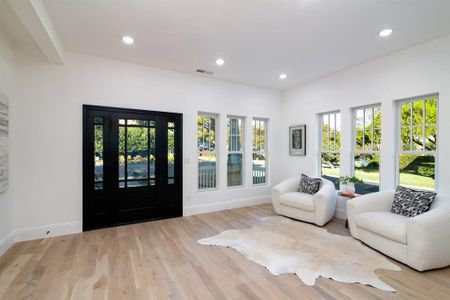 Living area featuring light wood-type flooring