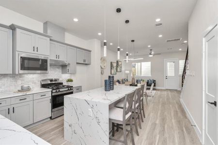 Spacious and open view from the dining area to the kitchen.