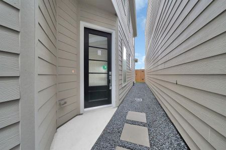 A side entry through your 8-ft door provides a cleaner and more streamlined front facade, enhancing the modern aesthetic of this home.