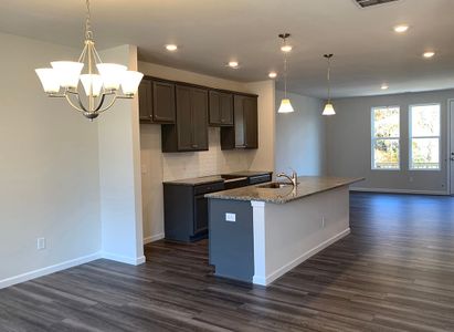 Dining room entrance looking towards kitchen and great room