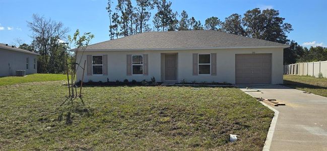 New construction Single-Family house 1311 Nelson Park Court, Poinciana, FL 34759 Palm- photo 0