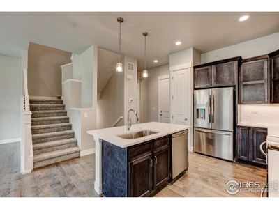 New construction Townhouse house 6239 Vernazza Way, Unit 2, Windsor, CO 80550 Carolina- photo 0