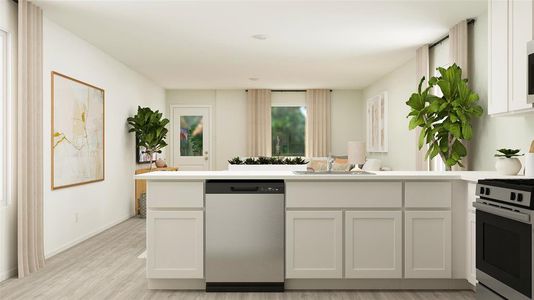 Kitchen with sink, white cabinets, stainless steel appliances, and light wood-type flooring