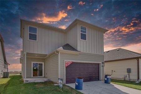 Rear patio and garage entrance