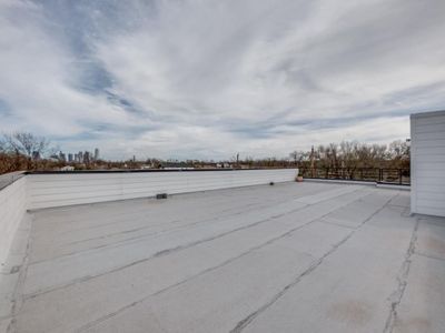 Rooftop with skyline views.