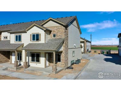 New construction Townhouse house 1731 Westward Cir, Unit 1, Eaton, CO 80615 - photo 0